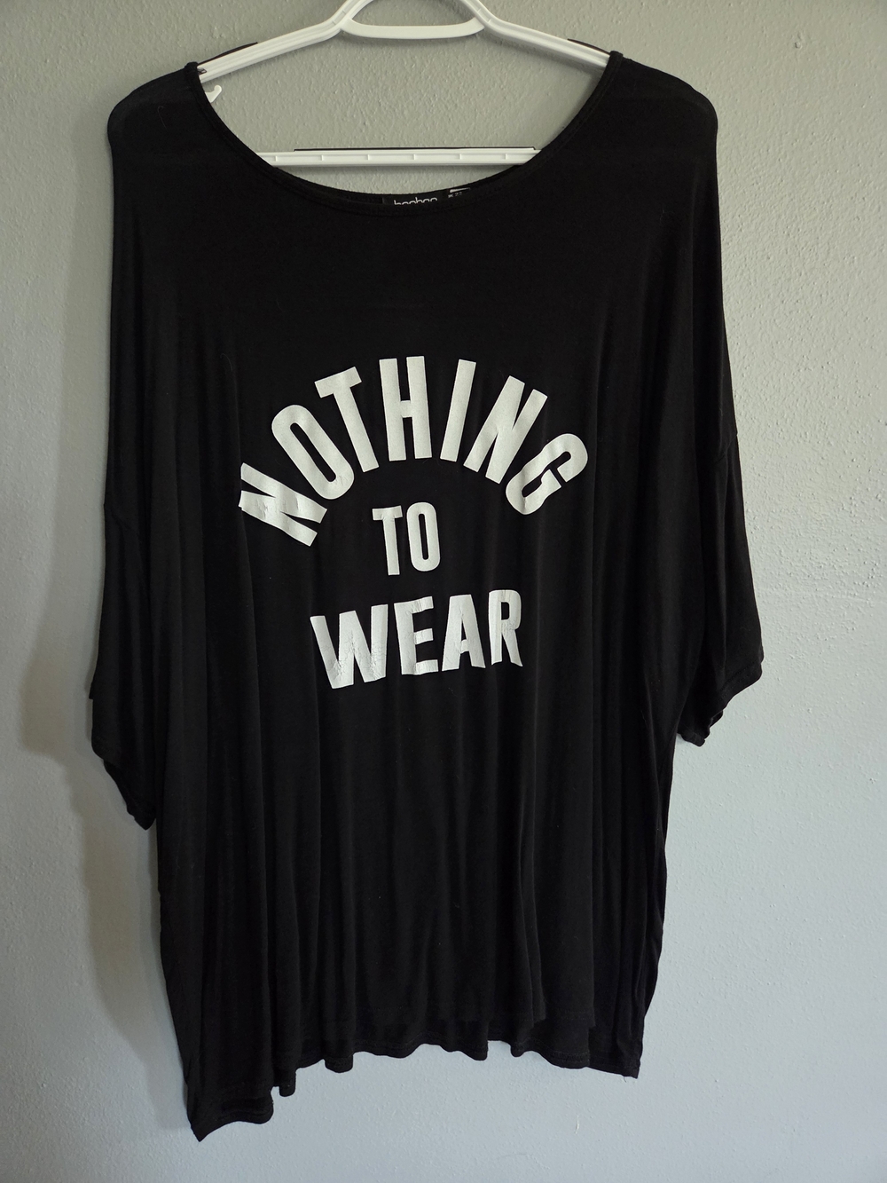 Boohoo Black Short Sleeve Top with White "Nothing To Wear" Graphic